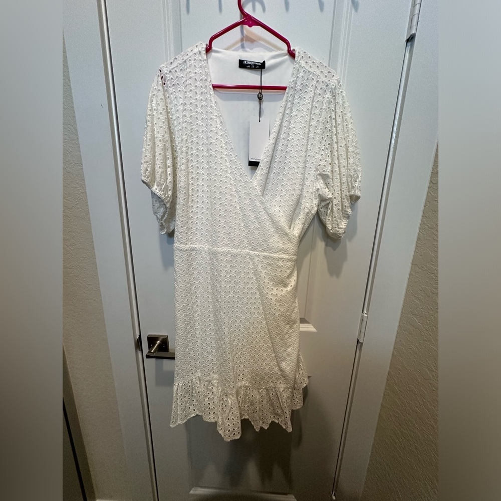 Fashion Union White eyelet wrap dress with puff sleeve. Size 14